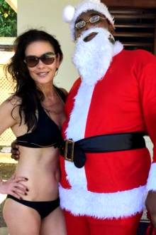 Catherine Zeta-Jones In A Bikini With Santa