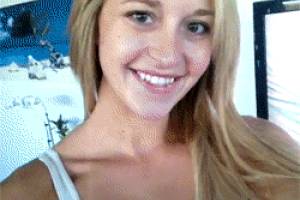 sexy blonde taking a selfie gif of her flashing her perfect body